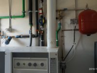 INSTALACIÓN DE CALDERA WOLF GASOLEO- CODENSACIÓN PARA SUELO RADIANTE + ACS